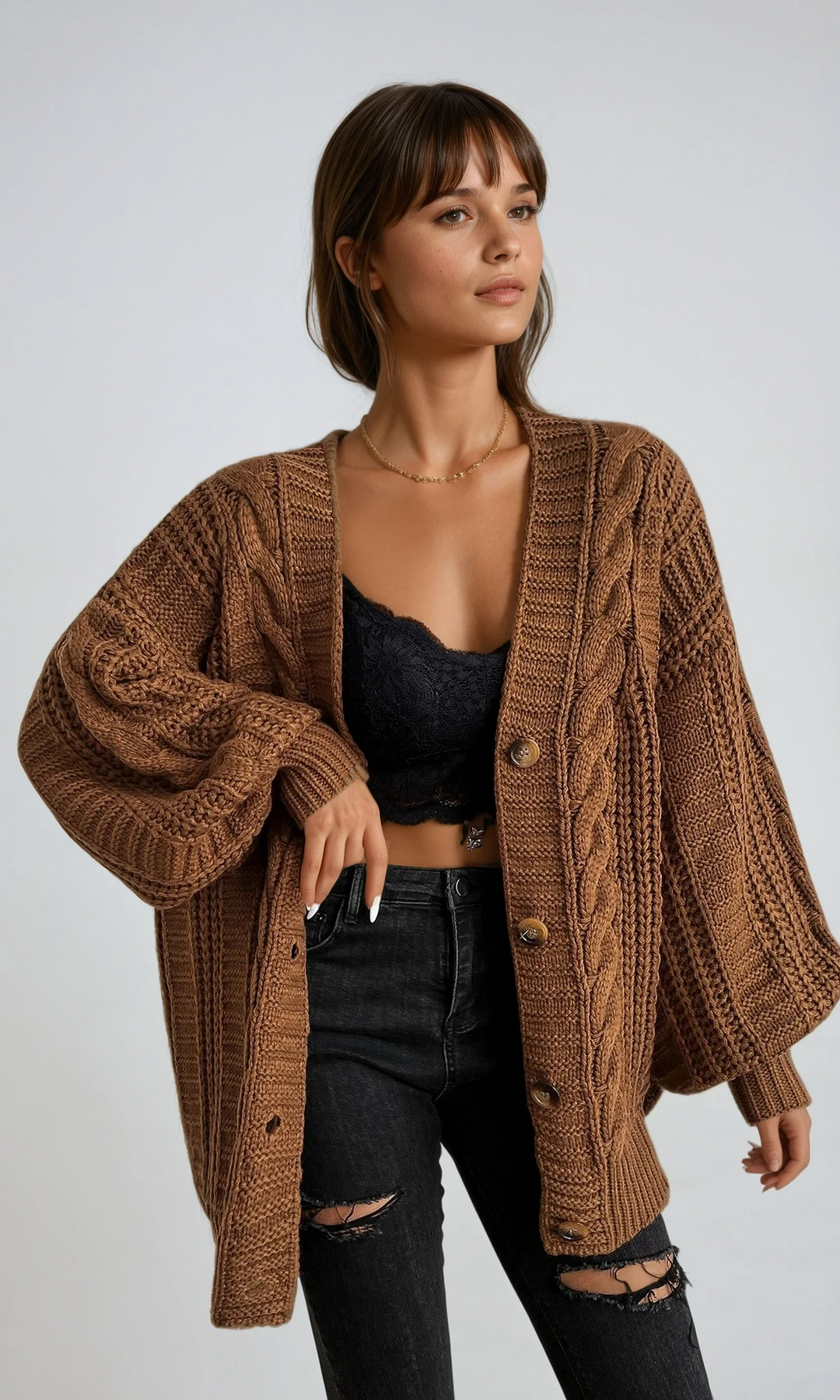 Übergrosse Kabelstrick-Strickjacke