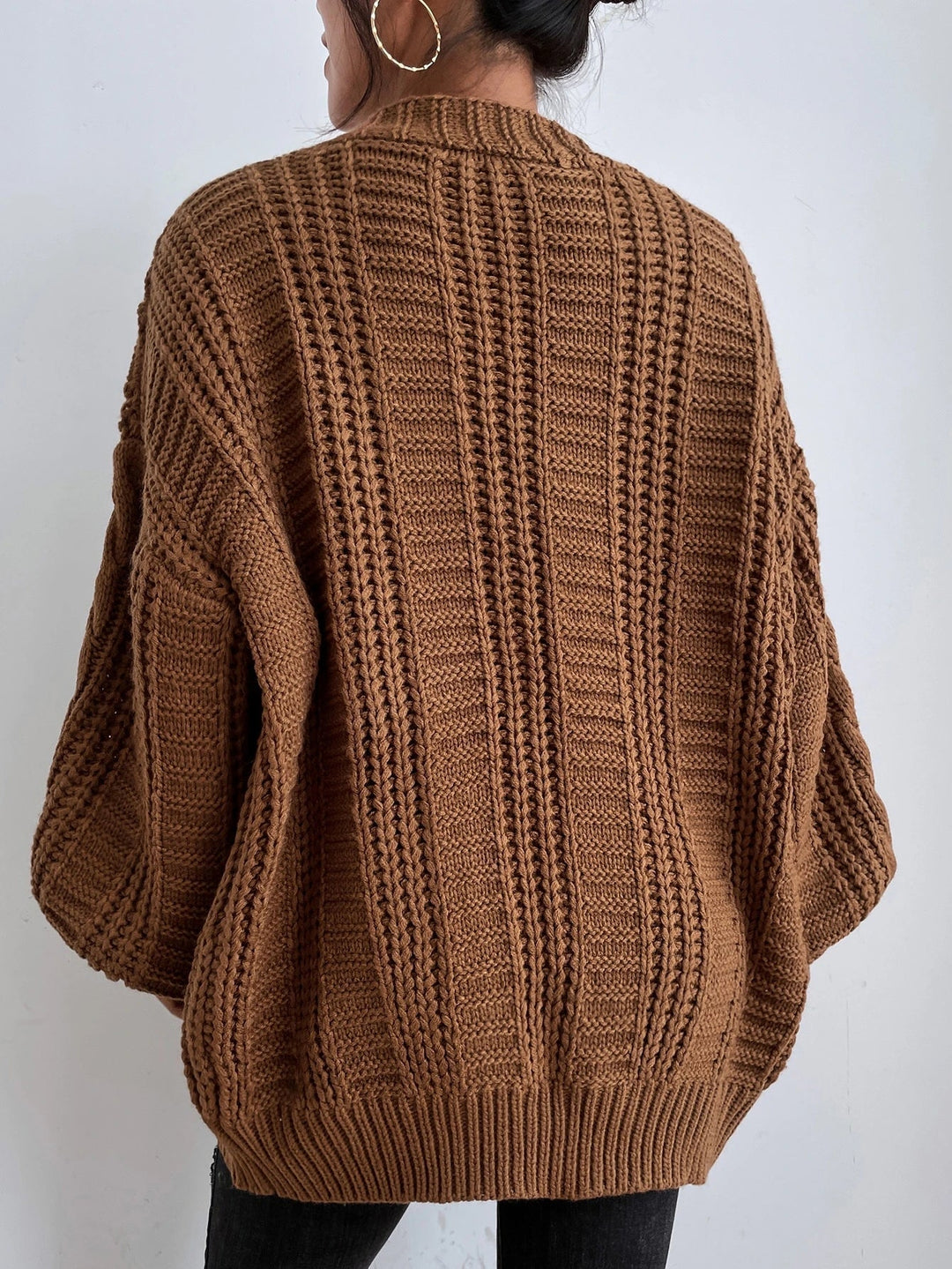 Übergrosse Kabelstrick-Strickjacke