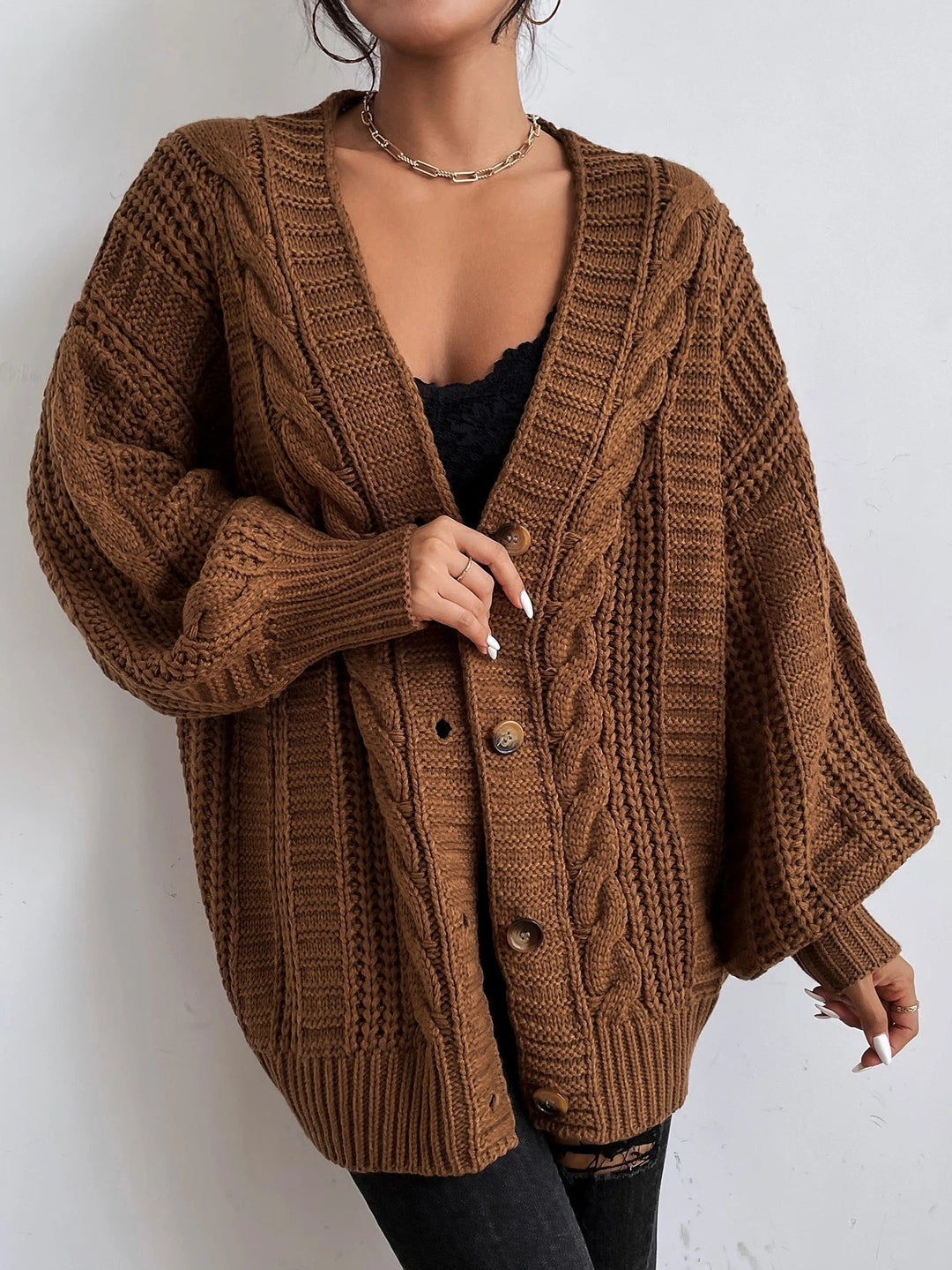 Übergrosse Kabelstrick-Strickjacke