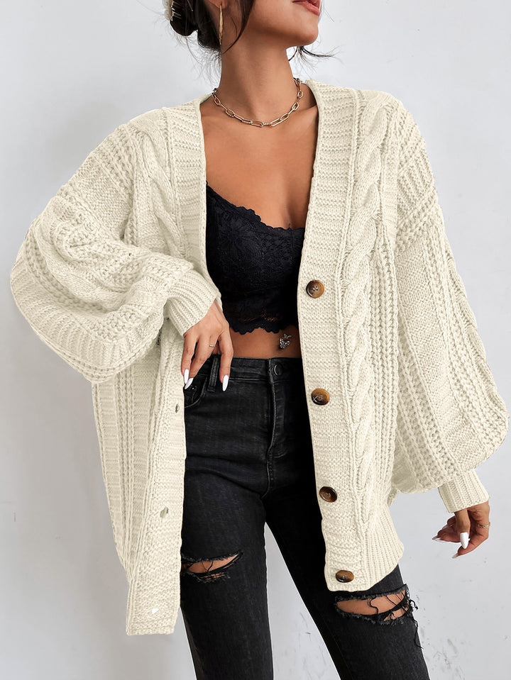Übergrosse Kabelstrick-Strickjacke