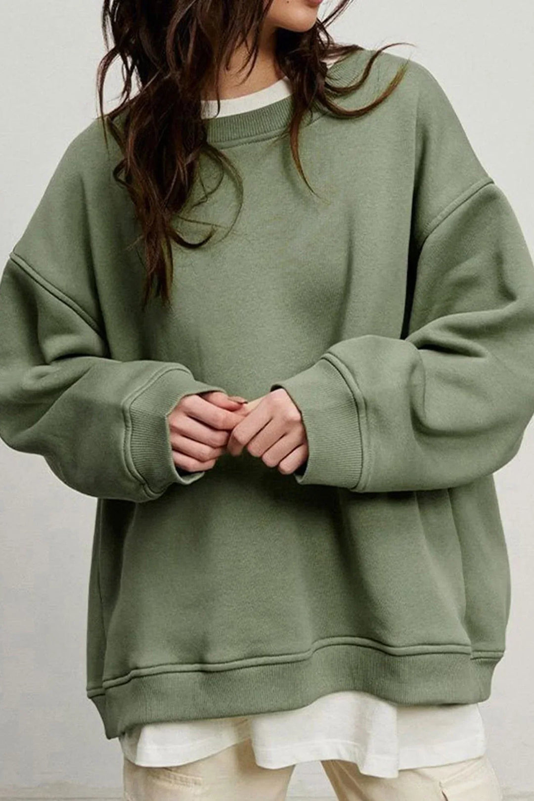 "Damen Oversized Sweatshirt mit Rundhalsausschnitt" could be rewritten as "Oversized Damen Sweatshirt mit Rundhalsausschnitt".