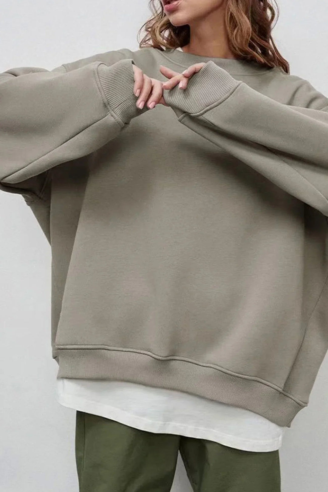 "Damen Oversized Sweatshirt mit Rundhalsausschnitt" could be rewritten as "Oversized Damen Sweatshirt mit Rundhalsausschnitt".