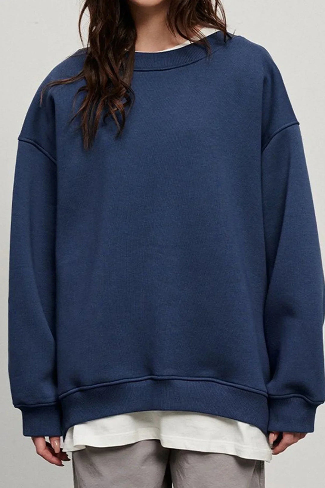 "Damen Oversized Sweatshirt mit Rundhalsausschnitt" could be rewritten as "Oversized Damen Sweatshirt mit Rundhalsausschnitt".