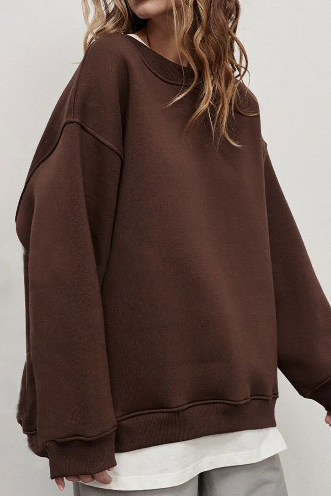 "Damen Oversized Sweatshirt mit Rundhalsausschnitt" could be rewritten as "Oversized Damen Sweatshirt mit Rundhalsausschnitt".
