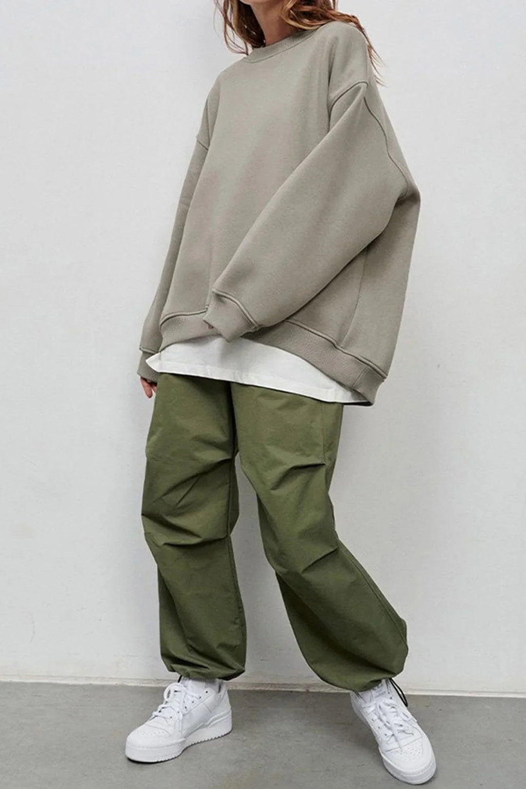 "Damen Oversized Sweatshirt mit Rundhalsausschnitt" could be rewritten as "Oversized Damen Sweatshirt mit Rundhalsausschnitt".