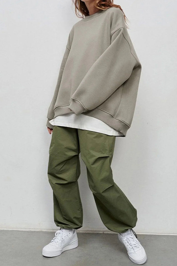 "Damen Oversized Sweatshirt mit Rundhalsausschnitt" could be rewritten as "Oversized Damen Sweatshirt mit Rundhalsausschnitt".